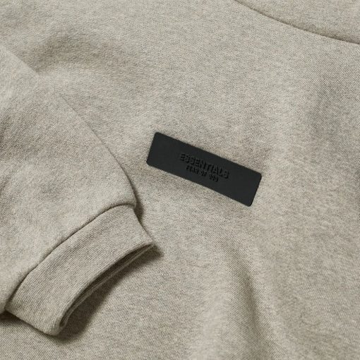 FEAR OF GOD ESSENTIALS KIDS DARK HEATHER OATMEAL TAB HOODIE SS24